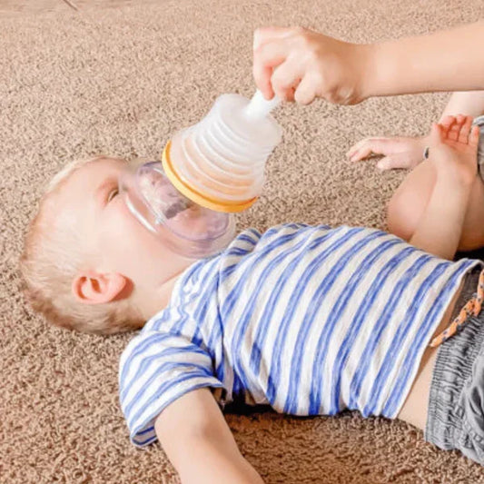 Baby anti-choking device being used to help clear airway safely during choking emergency