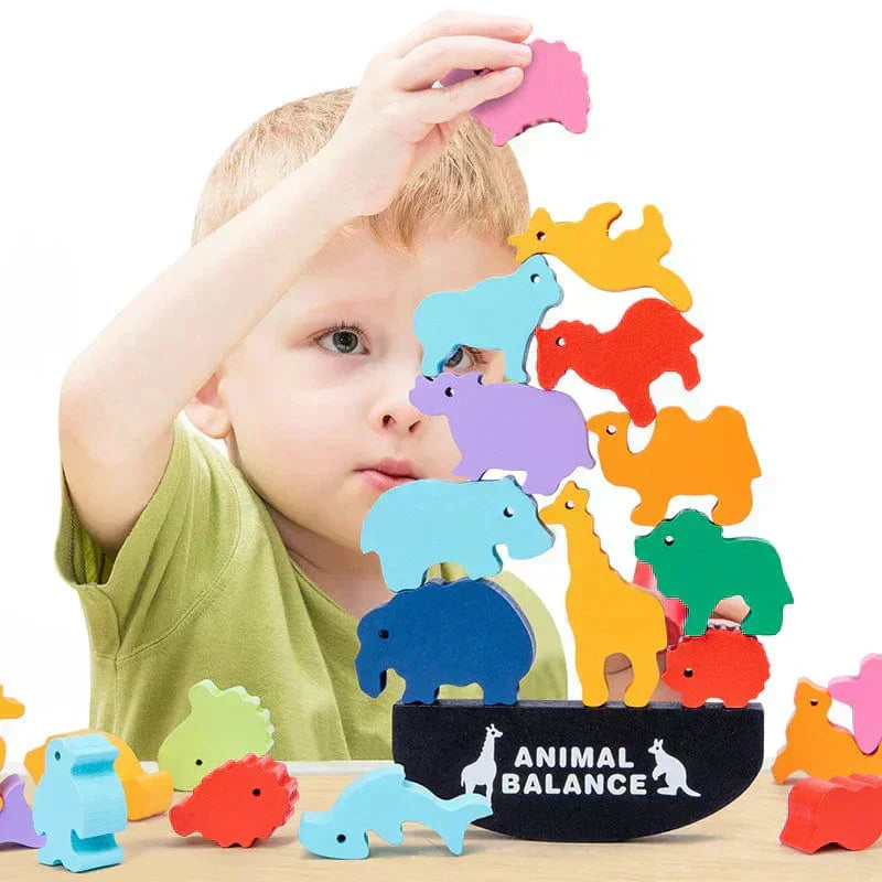 Toddler learning balance and problem solving using Montessori animal stacking toy